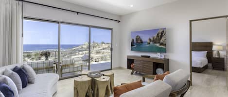 Breathe in the serenity: Your living room frames the beauty of the sea in every glance.
