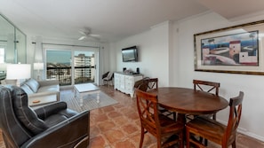 Dining Room with seating for 4 at the table and 4 additional bar stools