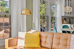 A stylish space, soft cushions, a nice view make this space so relaxing.