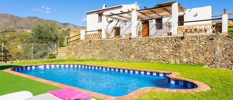 Beautiful villa with private pool, terrace, and garden with countryside views