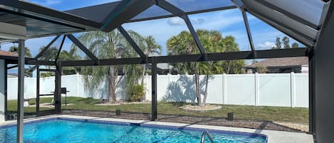 Brand new (MARCH 2024) panoramic style pool cage screened-in lanai! 