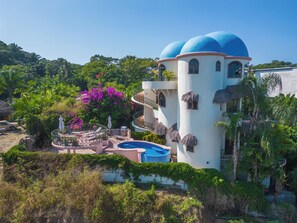 Elegant rounded architecture of Villa Poema de Amor
