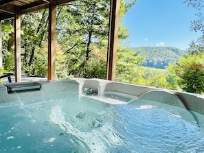 3 person hot tub with a view on lower patio