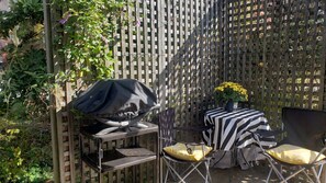 small patio with weber grill