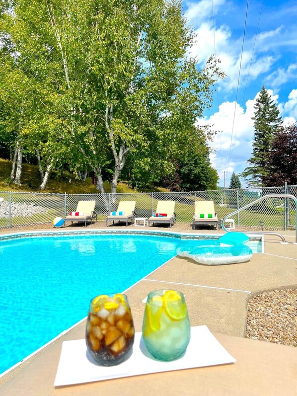 Heated pool with gradual sloping depth for kids and adults opened during summer months