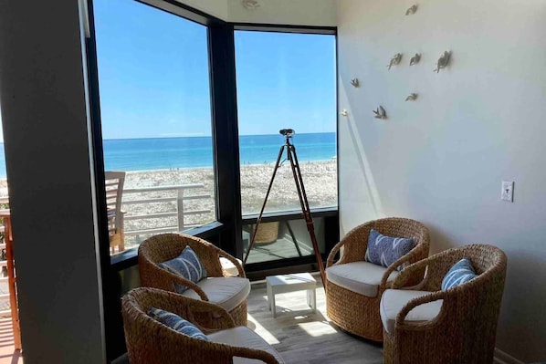 Enjoy stunning dune and Gulf vistas. Ideal for reading, conversations, and bird watching with the telescope!