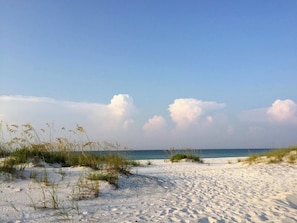Enjoy unobstructed views of the undeveloped, sugar white dunes right from the two balconies!
