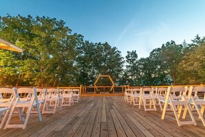 Deck in backyard that can seat up to 100. Perfect for a wedding!