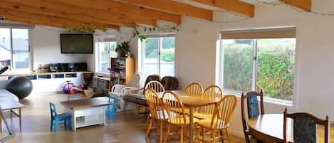Natural light all day long in the enormous sunroom.