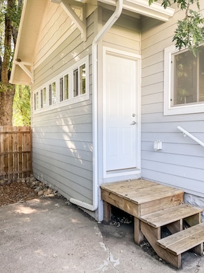 Side door to patio area & garage.