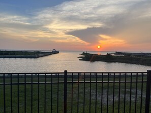 Sunset over Pamlico Sound from your private pool and entertainment area.