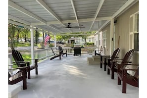 Huge front porch with 6' ceiling fan is wonderful to get out of sun/rain. 