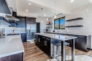 Plenty of space in the kitchen to eat in, inclusive of dual sinks for easy prep!