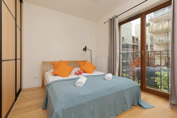 The bedroom's elegant decor creates a serene and restful environment.