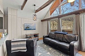 Homey Comfort: Instantly feel at home with a plush couch, a welcoming coffee table, the warmth of a gas stove, and the entertainment of a Smart TV for delightful movie nights.