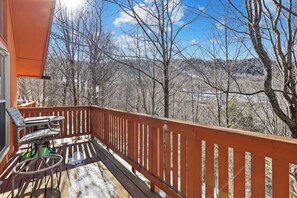 Serenity on the Deck: Experience the allure of nature on the outdoor deck, offering a comfy seating area for moments of tranquility and relaxation.