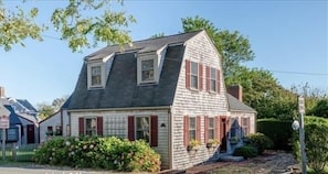 Front of house, driveway for parking