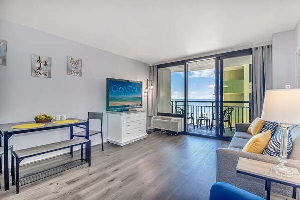 Embrace seaview elegance in our suite's living area, ensuring a luxurious stay with panoramic ocean scenes!