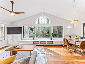 Gorgeous sunroom with huge window to enjoy nature while sipping your coffee or wine