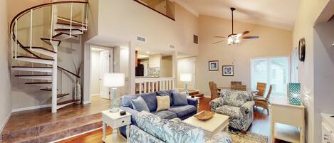 Living Room with Spiral Staircase