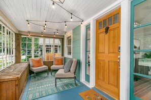 Enclosed Front Patio with String Lights