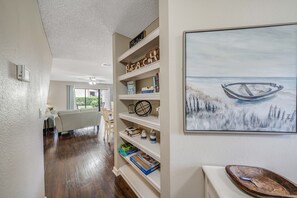 Entry way. Entire unit is tastefully decorated with coastal decor.