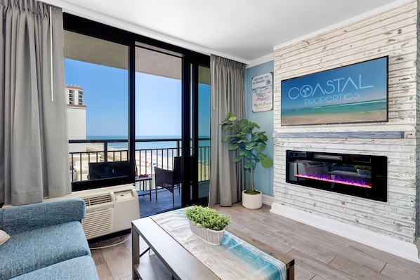 Step into our inviting living room space, where every moment is infused with warmth and relaxation.