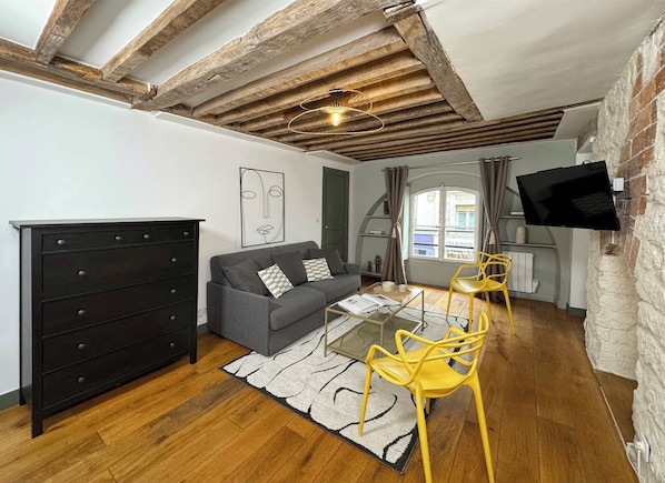 Very cool lounge area with TV and storage for your belongings.