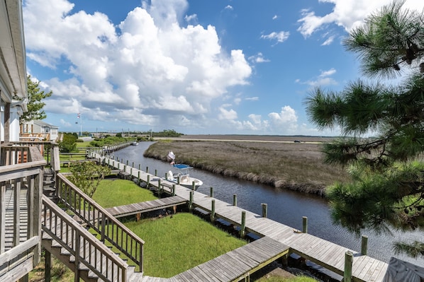 Your vacation starts HERE! Steps from Pirate's Cove Marina & close to the beach!