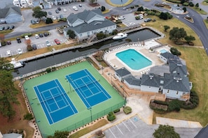 Walk or drive to the nearby pool and tennis courts!