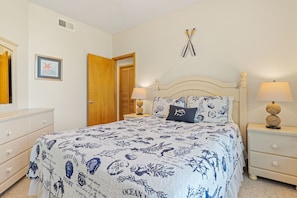 First level Queen bedroom just beyond kitchen area