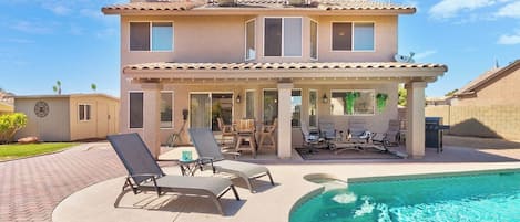 You've found Paradise in Peoria! Relax in the backyard with your friends and family. Splash in the pool and lounge on the patio furniture! Enjoy a nice BBQ dinner as you watch the sunset from a floaty in the pool! 