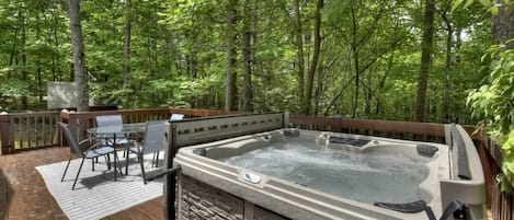 Relax in the hot tub and enjoy natures beauty