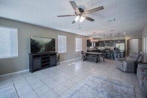 Great Room with 72 inch smart TV 

