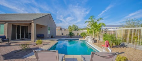 Large private backyard with built-in pool, outside seating, gas firepit, BBQ
