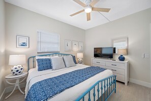 A bright and inviting bedroom with stylish décor and a comfortable bed for a restful stay.