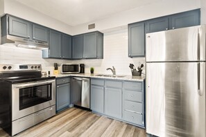 Kitchen with new, stainless steal appliances 