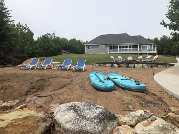 Sandy lakefront beach and fire pit! Best place to relax 😎