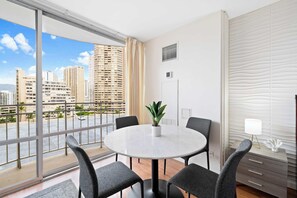 Cute and simple white table with aesthetic chairs