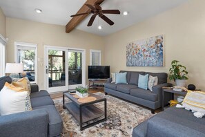 Gather around the sunken den located between the kitchen and screened-in porch.