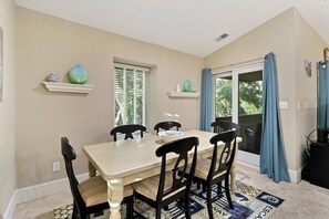 1692 Bluff Villas - Dining Area - Dining room has easy access to outdoor deck.