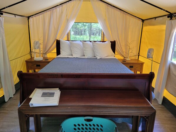 Roomy interior with comfy furnishings and portable fans