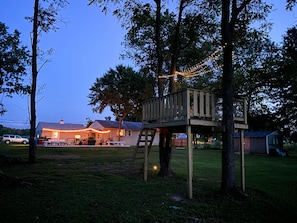 Enjoy all the backyard has to offer including the treehouse!