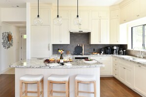 Chef’s kitchen with Thermador appliances.