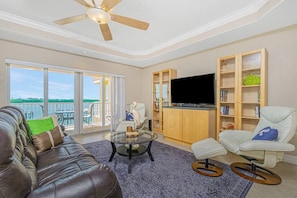 Spacious open concept living room with view of Lemon Bay.