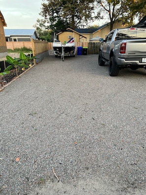 Huge driveway. Multiple cars, RV, boat parking.