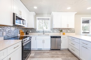 Brand new updated kitchen with great layout and  stainless steel appliances! 