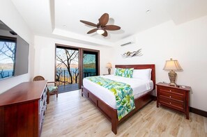 Relax in the main bedroom with a view of Potrero Bay from your balcony!