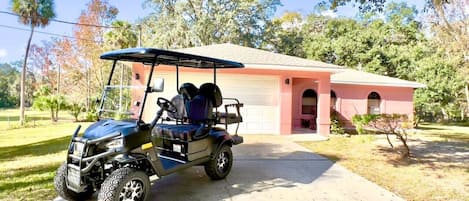 Front Entry of Sea Cow Shack! 4 Seater Golf Cart with rental.