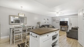 First Floor Full Size Kitchen with Island Bar Seating